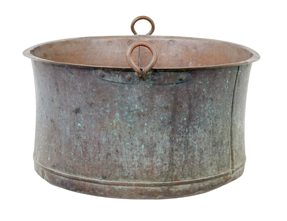 A large 19th-century cylindrical copper cooking pot featuring rolled rims, riveted side handles, and surface verdigris patina. View II