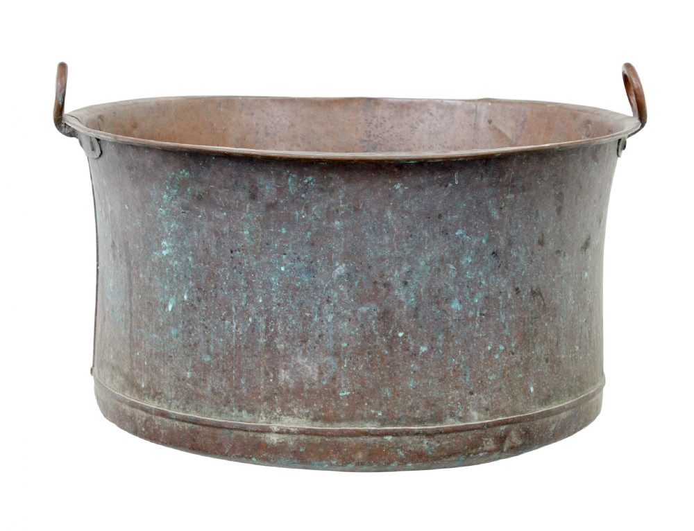 A large 19th-century cylindrical copper cooking pot featuring rolled rims, riveted side handles, and surface verdigris patina. View IV