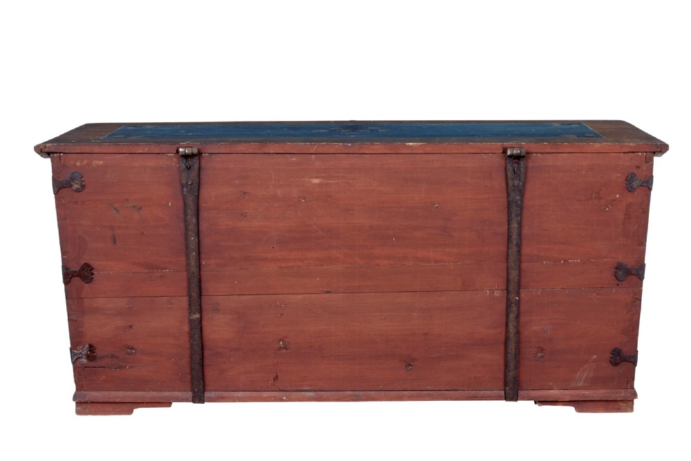 A mid-19th-century Swedish painted wooden coffer featuring blue centre panels decorated with a floral wreath and the date 1855, framed by terracotta borders and black wrought iron straps. View IV