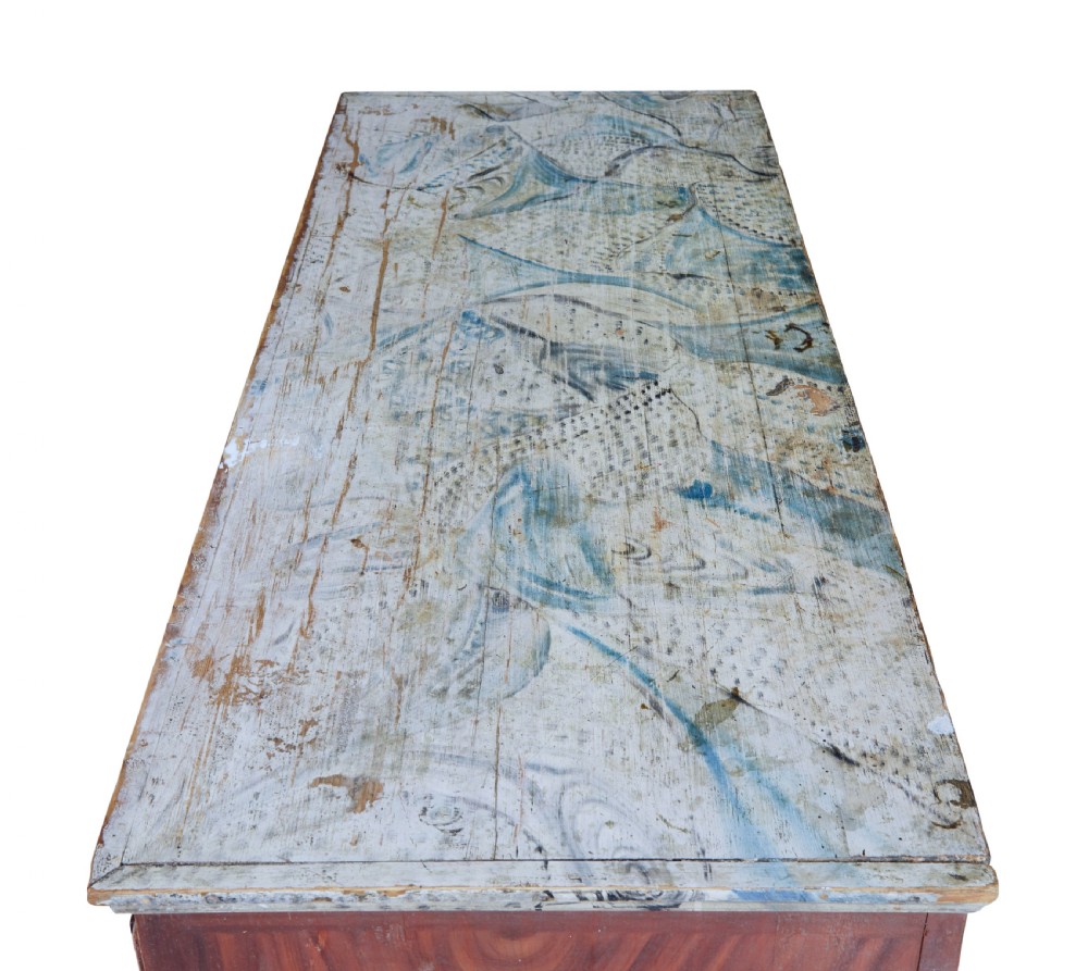 A nineteenth-century Swedish three-drawer chest featuring a reddish-brown faux-grain painted finish and oval brass handles. View II