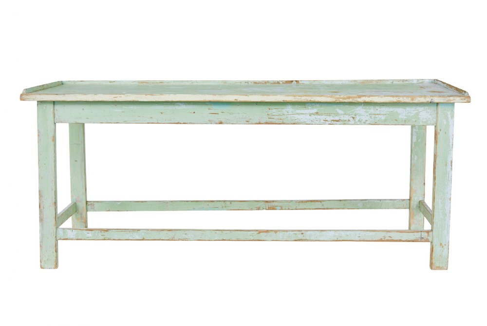 A 19th-century Swedish baking table featuring a pale green painted finish, a raised perimeter edge, and square legs connected by stretchers. View II