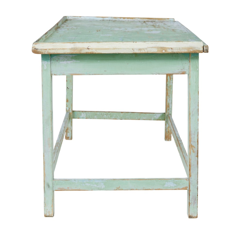 A 19th-century Swedish baking table featuring a pale green painted finish, a raised perimeter edge, and square legs connected by stretchers. View IV