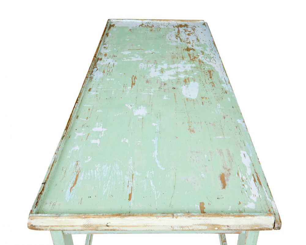 A 19th-century Swedish baking table featuring a pale green painted finish, a raised perimeter edge, and square legs connected by stretchers. View VII