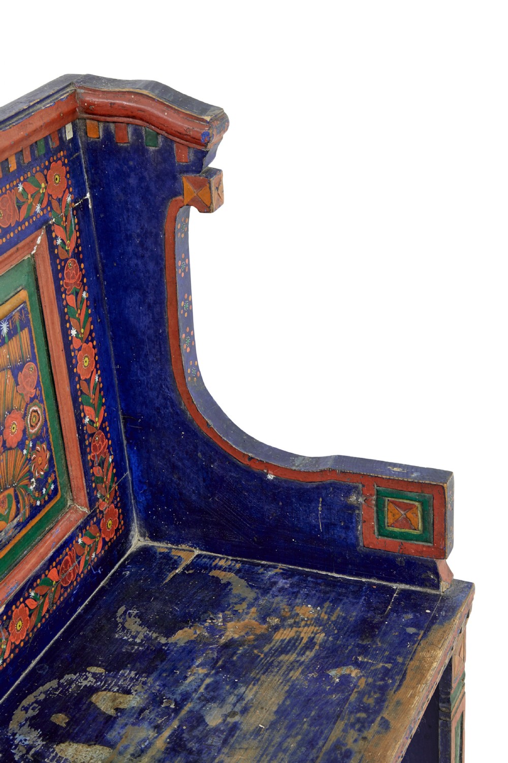 A nineteenth-century L-shaped wooden corner bench featuring hand-painted floral panels in red, green, and orange over a deep blue frame. View IX