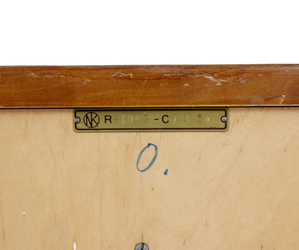 A mid-century modern double-door wardrobe crafted from figured golden birch wood with short tapered legs. View XIII
