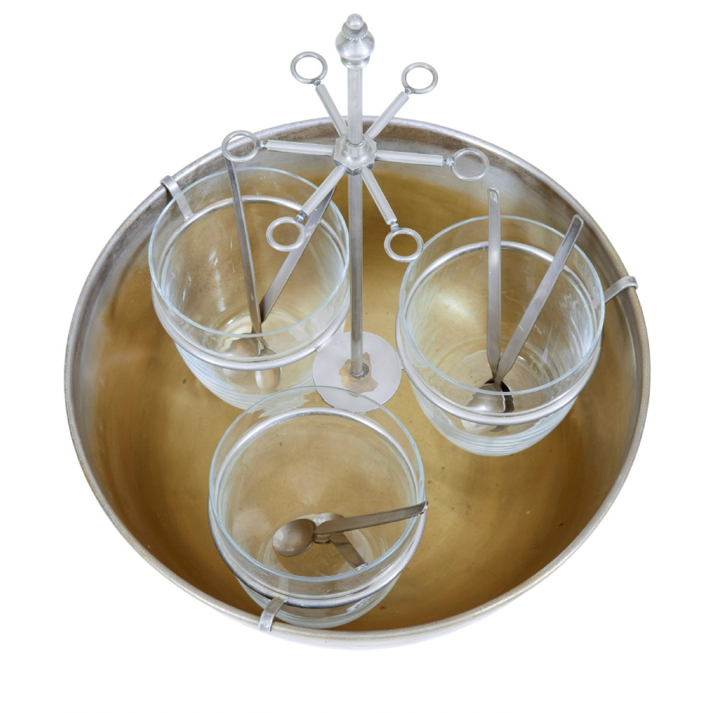 An early 20th-century Scandinavian metal and glass caviar ice server set featuring a central bowl, three lidded glass jars, and suspended spoons. View III