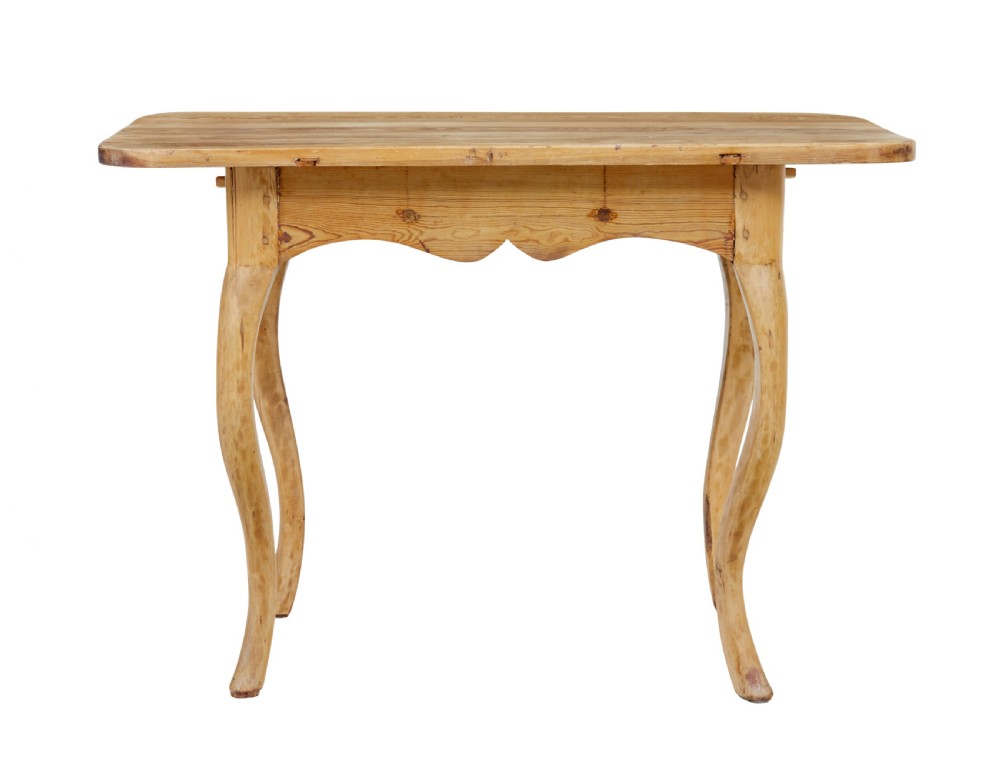 A 19th-century Swedish Rococo Revival side table made of natural scrubbed pine featuring cabriole legs and a single small drawer. View V