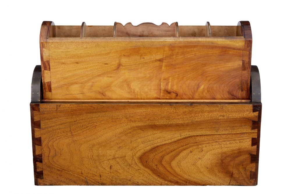 A mid-nineteenth century camphorwood campaign lap desk featuring a curved tambour roll top, sloped front, and recessed brass handles. View V
