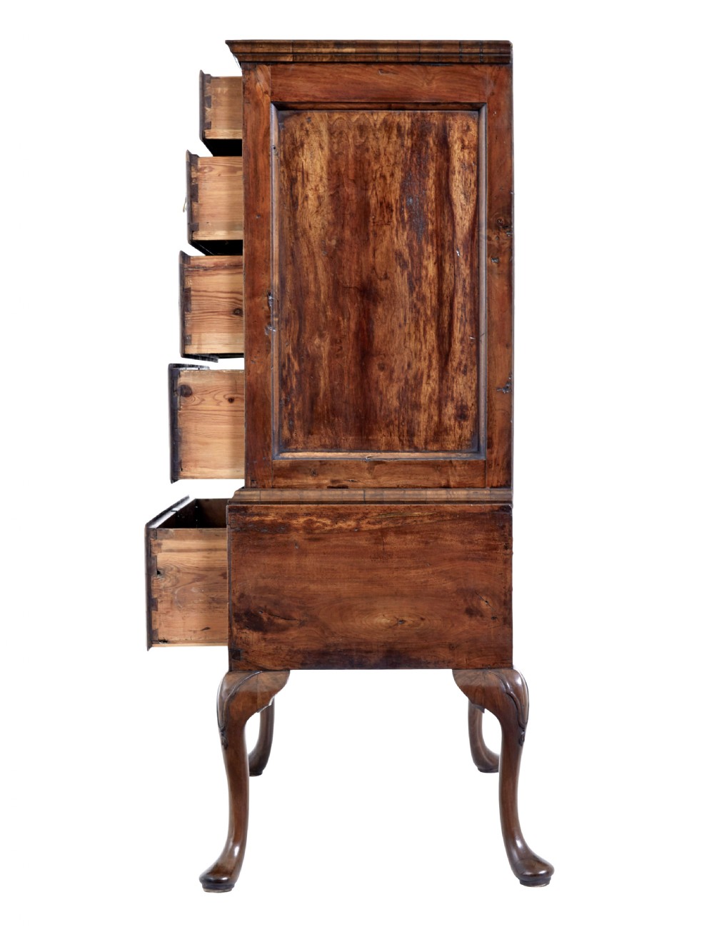 A late 17th-century William and Mary walnut chest on stand featuring five upper drawers, a single base drawer, decorative brass backplate handles, and cabriole legs. View V