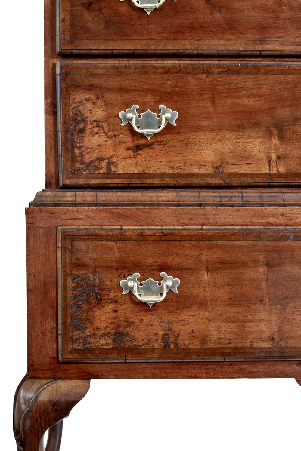 A late 17th-century William and Mary walnut chest on stand featuring five upper drawers, a single base drawer, decorative brass backplate handles, and cabriole legs. View XI