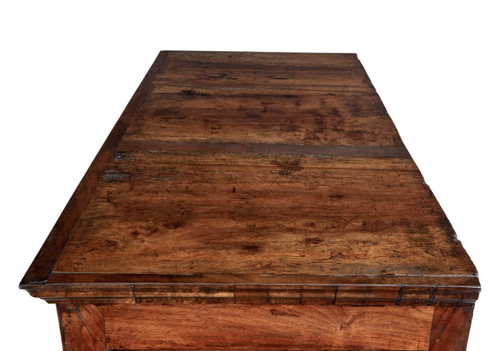 A late 17th-century William and Mary walnut chest on stand featuring five upper drawers, a single base drawer, decorative brass backplate handles, and cabriole legs. View XII