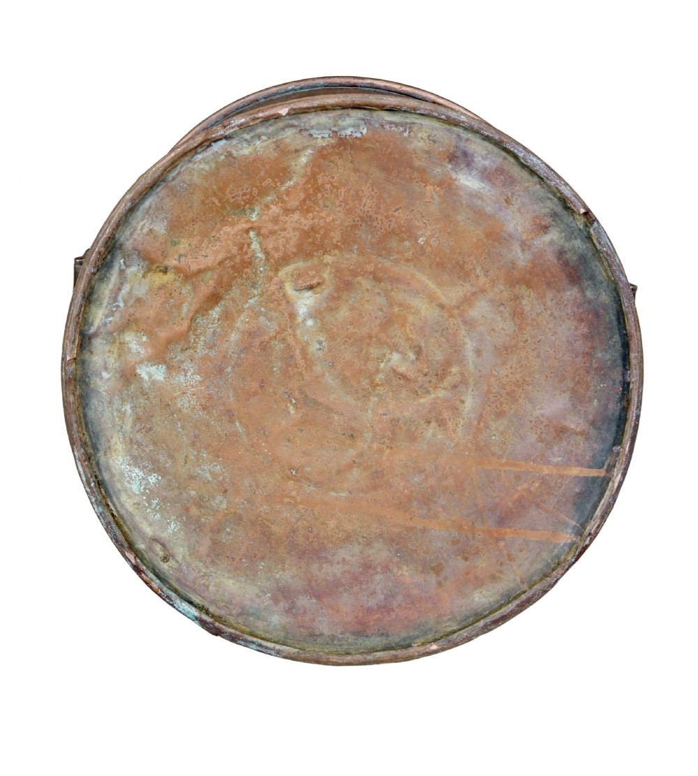 A cylindrical 19th-century copper vessel with horizontal ribbed banding and cast brass side handles. View V