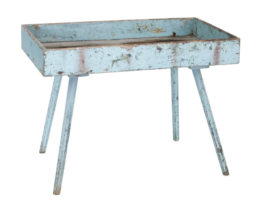A 19th-century rustic pine tray table with a deep rectangular gallery top and four splayed legs in a distressed light blue painted finish.