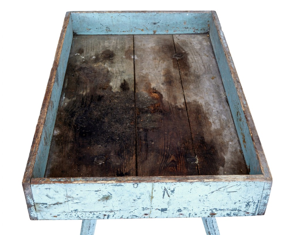 A 19th-century rustic pine tray table with a deep rectangular gallery top and four splayed legs in a distressed light blue painted finish. View II