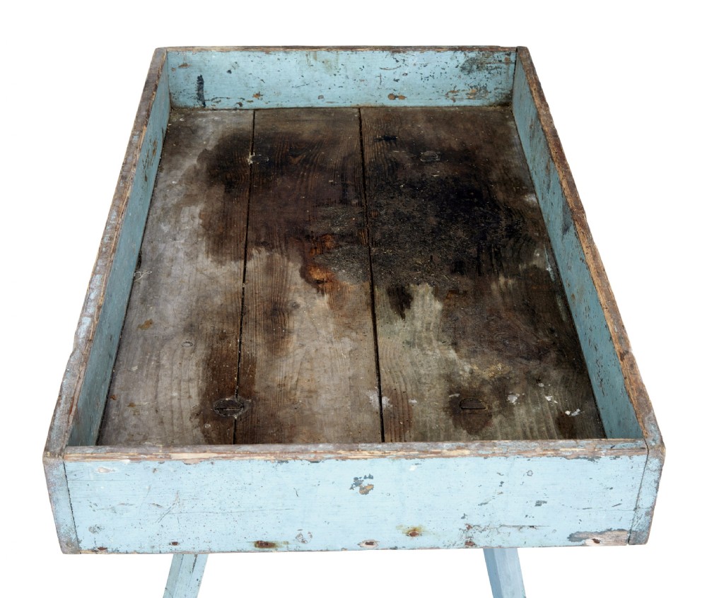 A 19th-century rustic pine tray table with a deep rectangular gallery top and four splayed legs in a distressed light blue painted finish. View III
