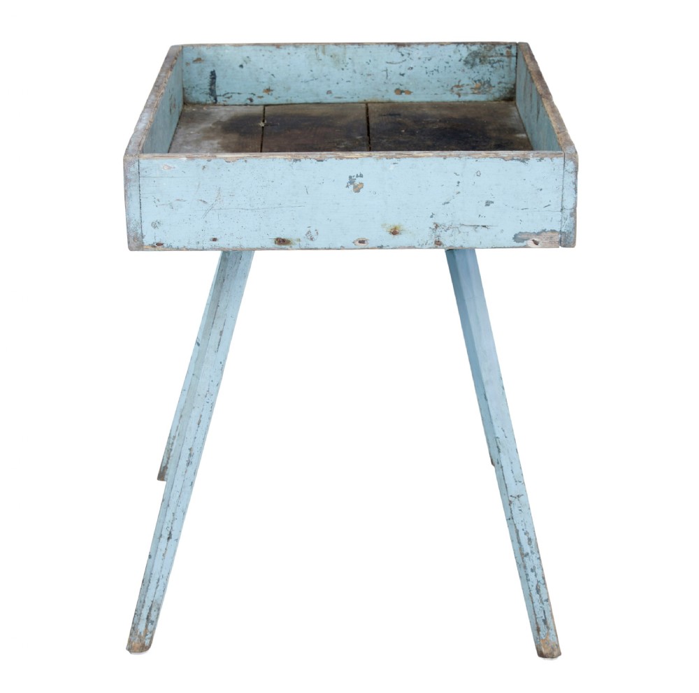 A 19th-century rustic pine tray table with a deep rectangular gallery top and four splayed legs in a distressed light blue painted finish. View VII