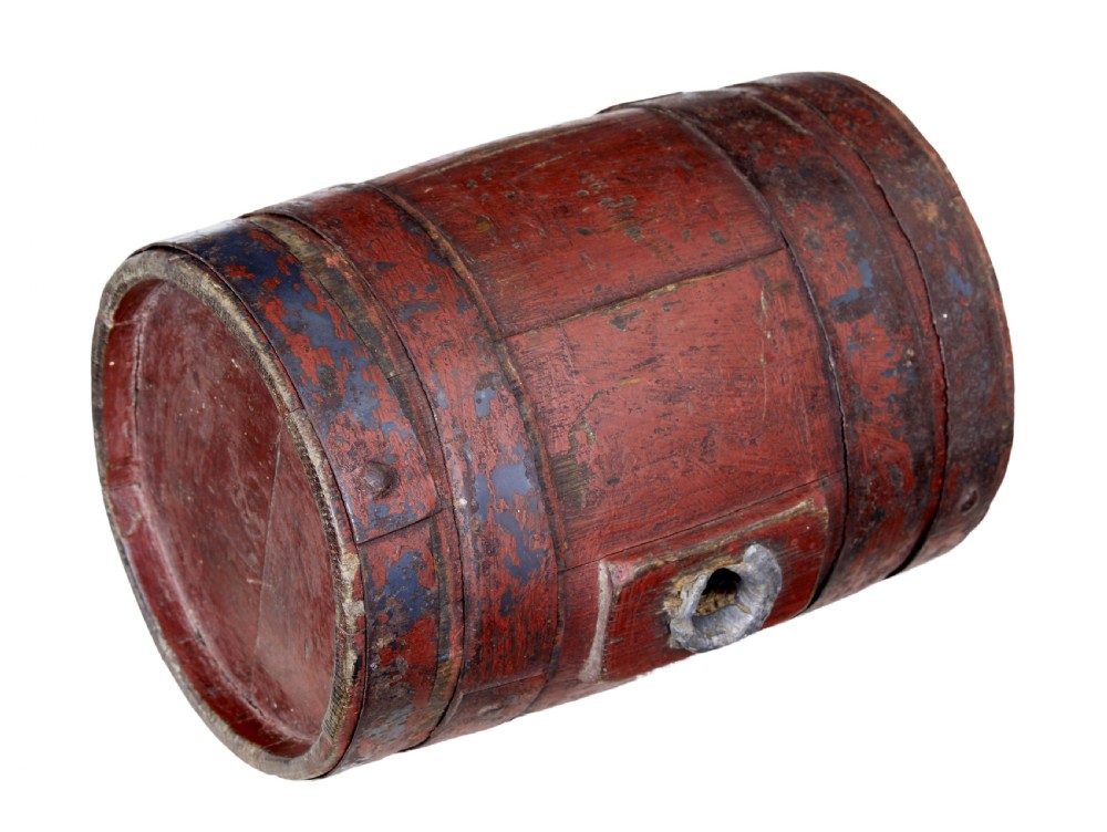 A 19th-century Scandinavian oak barrel featuring distressed red painted staves, dark metal hoops, and a lead-lined side bung hole. View II