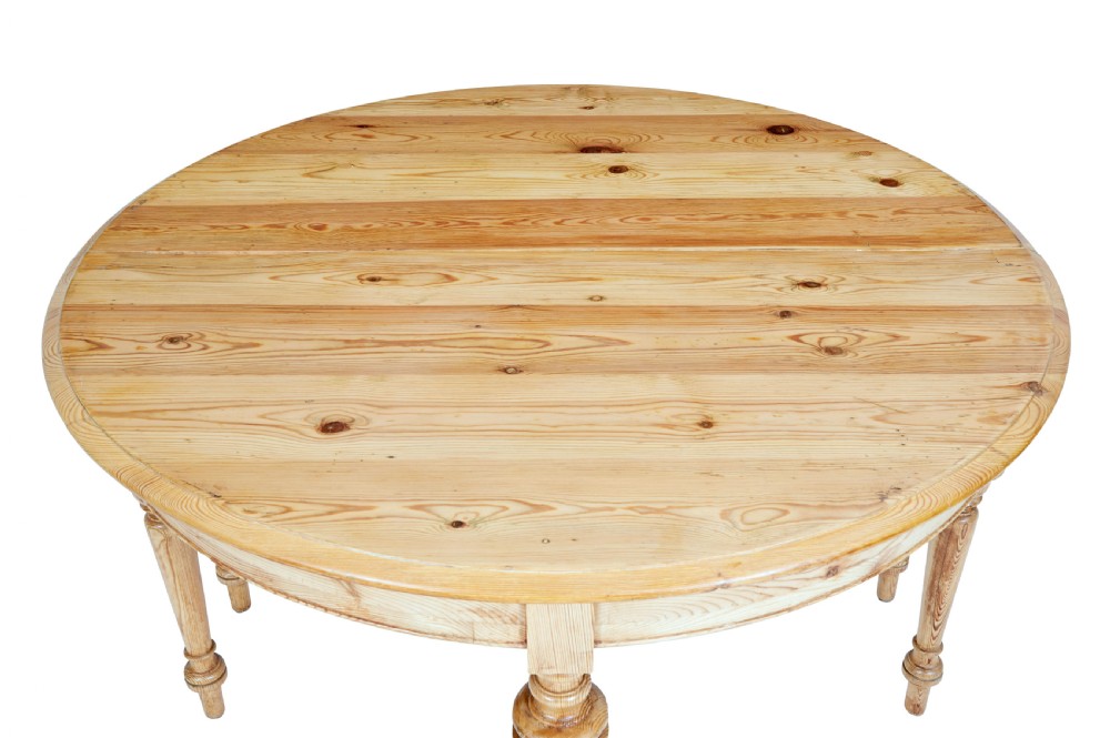 A pair of 19th-century Swedish pine demi-lune tables with turned legs placed together to form a circular top. View IV