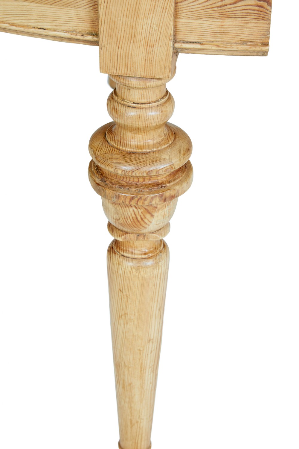 A pair of 19th-century Swedish pine demi-lune tables with turned legs placed together to form a circular top. View VI