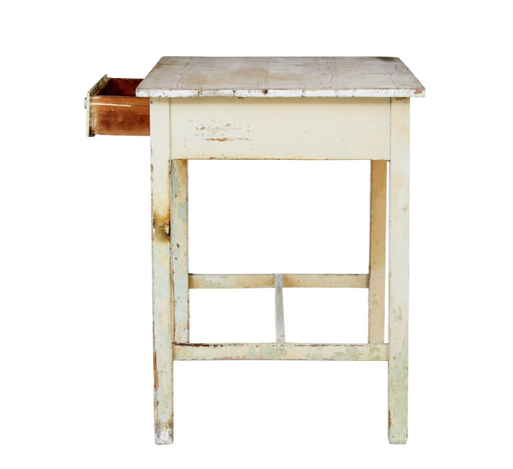 A 19th-century pine side table featuring a distressed off-white painted finish, a single frieze drawer with a wooden knob, and straight square legs supported by lower stretchers. View IV
