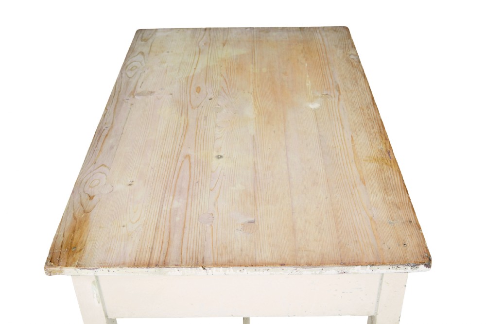 A 19th-century pine side table featuring a distressed off-white painted finish, a single frieze drawer with a wooden knob, and straight square legs supported by lower stretchers. View VII