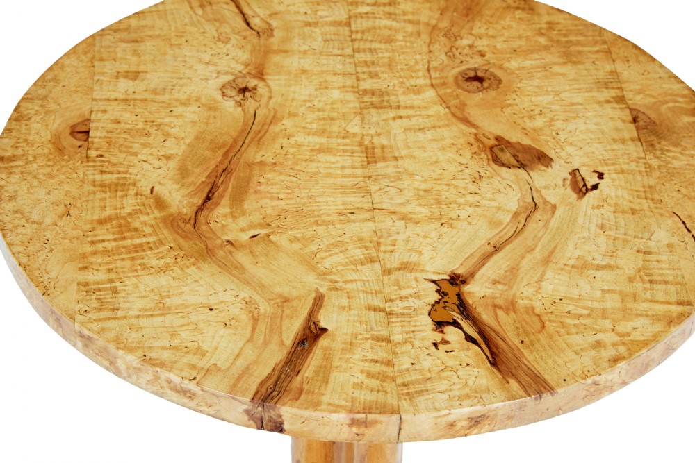 A mid-19th century occasional table featuring a circular top in figured birch root wood set upon a central column and three curved tripod legs. View III