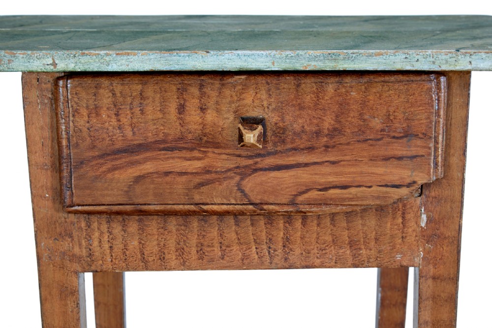 A pair of small wooden Swedish side tables featuring single drawers with square wooden knobs, straight tapered legs, and painted green tops. View IV