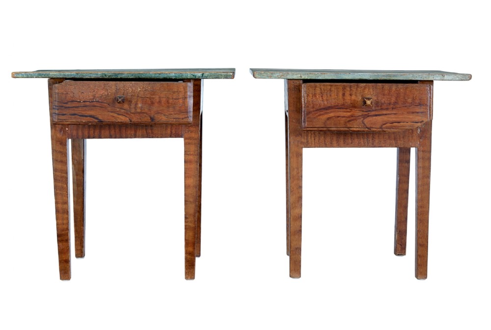 A pair of small wooden Swedish side tables featuring single drawers with square wooden knobs, straight tapered legs, and painted green tops. View VI