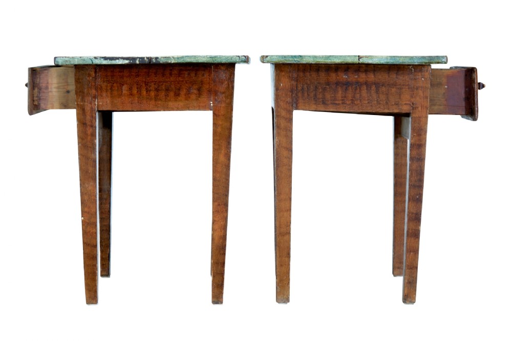 A pair of small wooden Swedish side tables featuring single drawers with square wooden knobs, straight tapered legs, and painted green tops. View VII