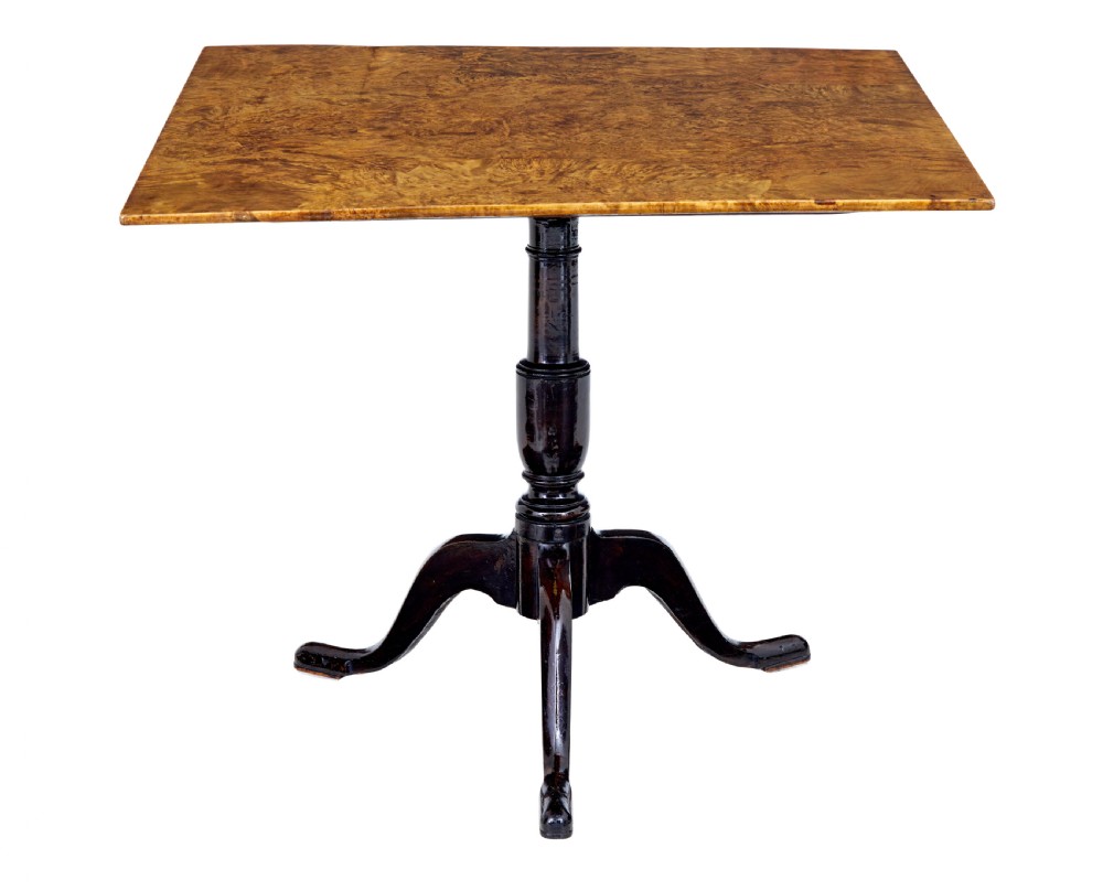 A nineteenth-century Swedish tilt-top side table featuring a square golden alder root top set on a dark turned central column with three splayed legs.