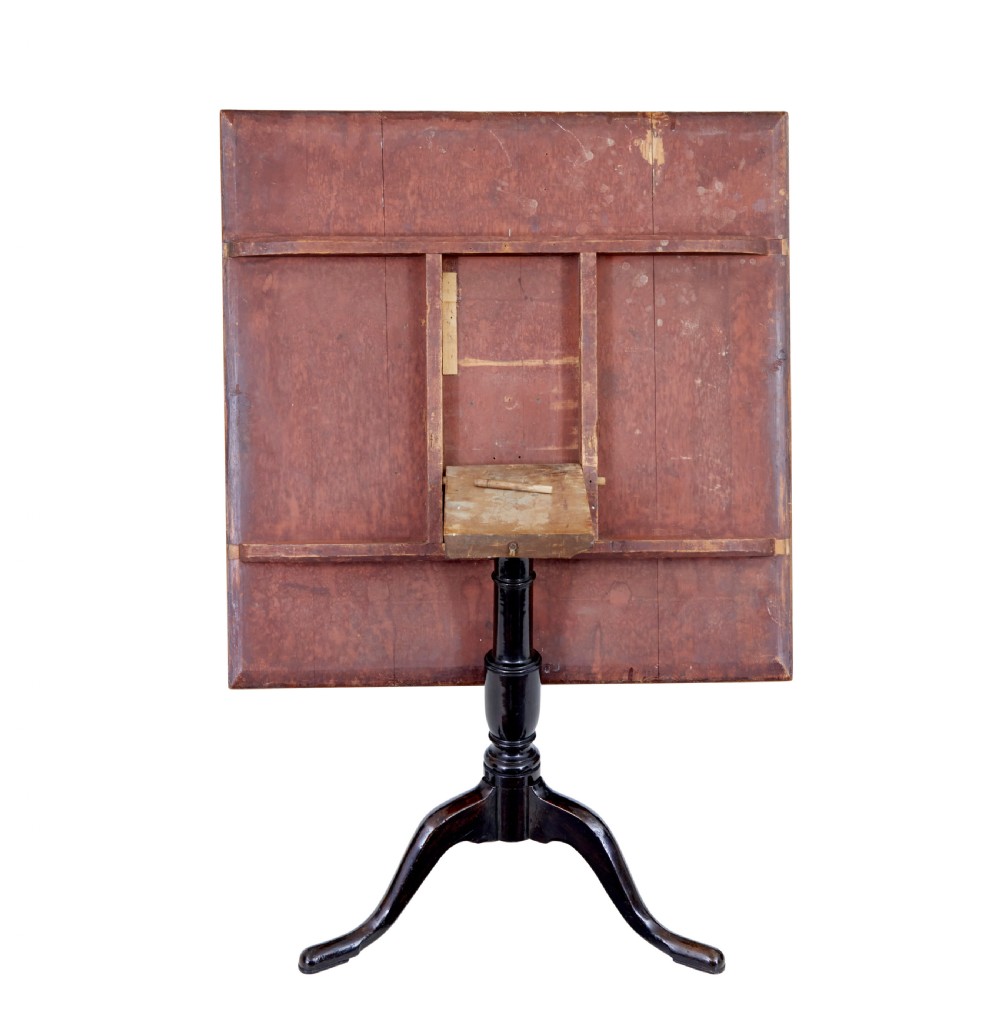 A nineteenth-century Swedish tilt-top side table featuring a square golden alder root top set on a dark turned central column with three splayed legs. View IV