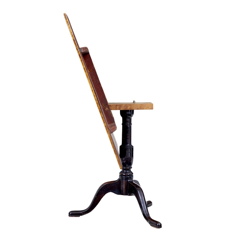 A nineteenth-century Swedish tilt-top side table featuring a square golden alder root top set on a dark turned central column with three splayed legs. View VII
