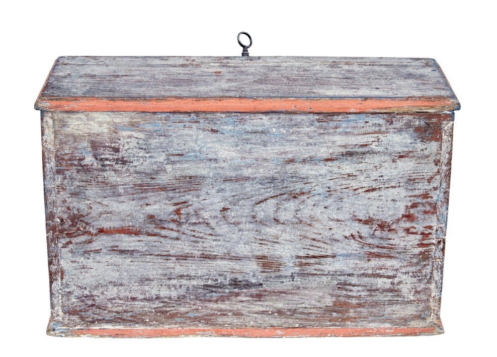 A mid 19th-century Swedish wooden tabletop writing desk with a slanted lid, distressed red and grey paint finish, and a hand-painted foliage wreath motif around the keyhole. View VIII