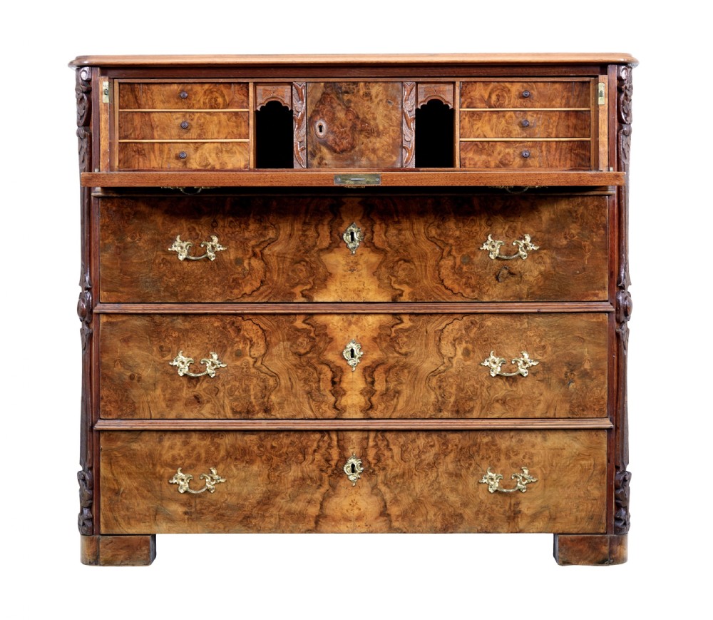 A nineteenth-century burr walnut secretaire chest of drawers featuring book-matched veneer drawer fronts and cast brass drop handles. View III