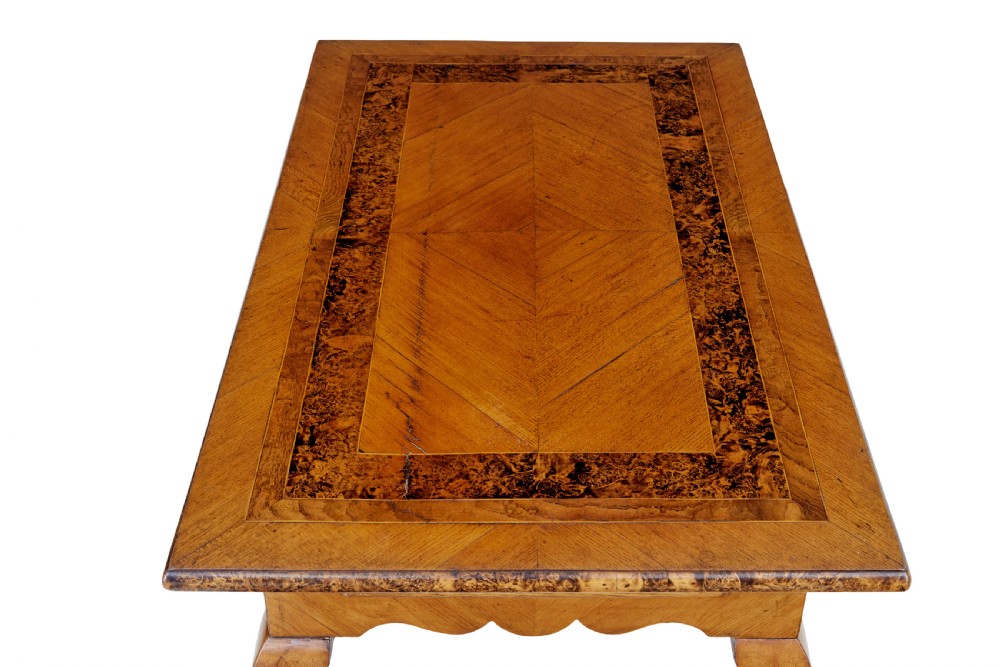 A mid 19th-century Swedish rectangular occasional table crafted from golden brown alder root wood with slender cabriole legs and a contoured apron. View VII
