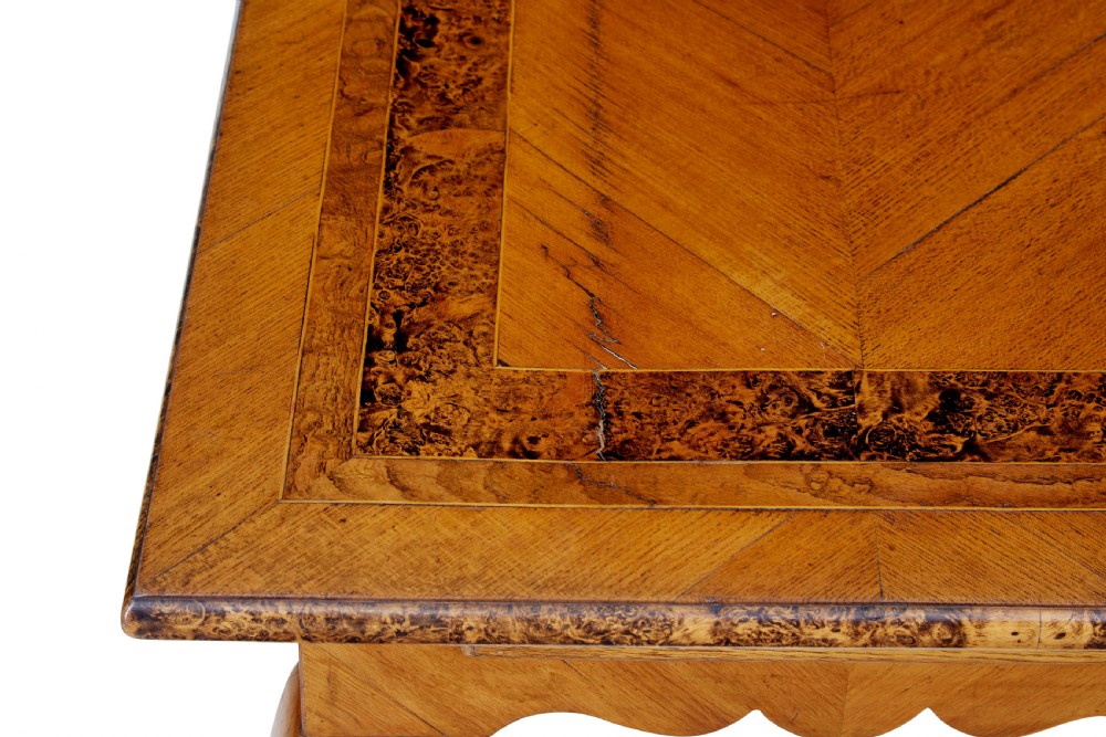 A mid 19th-century Swedish rectangular occasional table crafted from golden brown alder root wood with slender cabriole legs and a contoured apron. View VIII