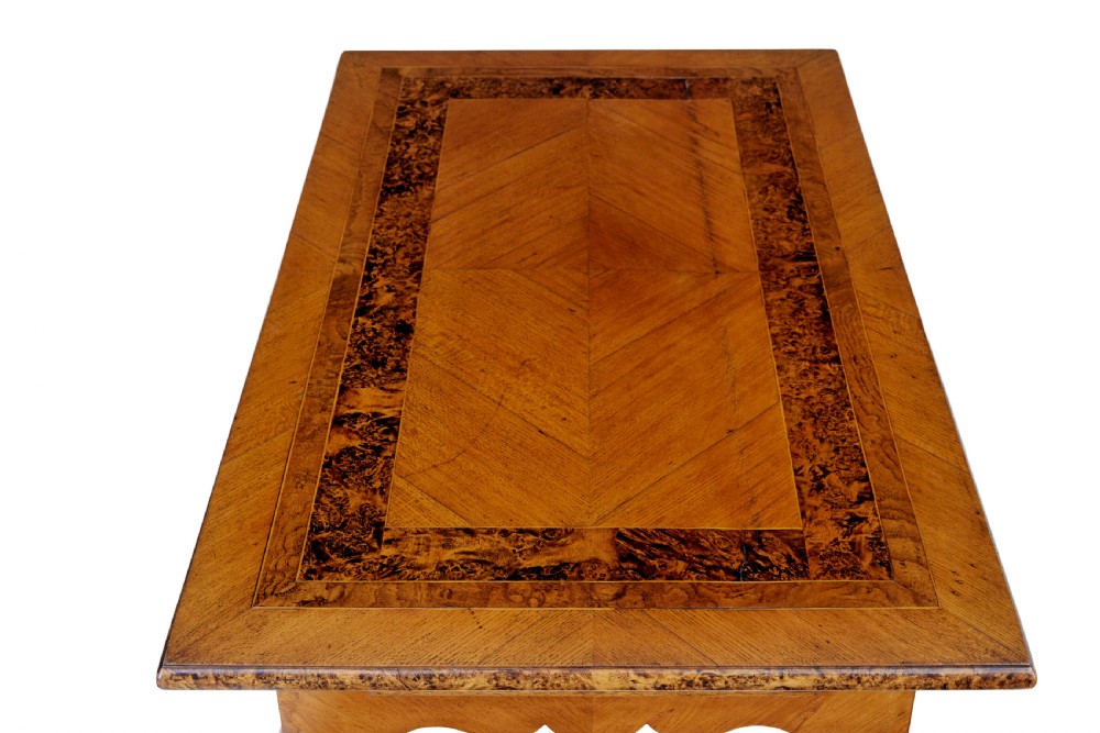 A mid 19th-century Swedish rectangular occasional table crafted from golden brown alder root wood with slender cabriole legs and a contoured apron. View X