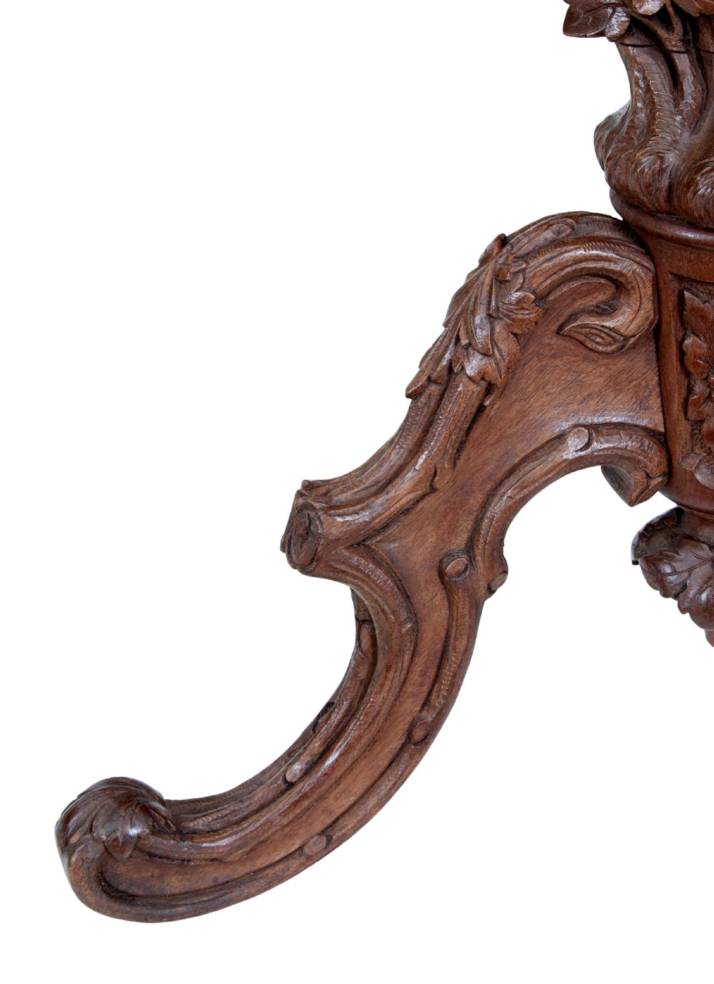 A carved oak tripod fire screen with a crest carved as a bird surrounding a woven tapestry panel featuring pineapple motifs. View V