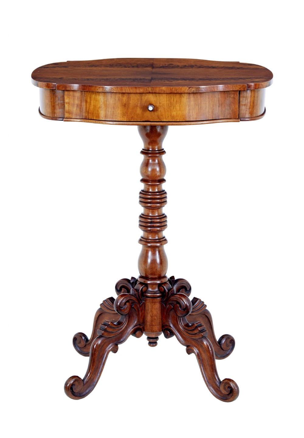 A 19th-century flame mahogany side table with a shaped top, turned central column stem, and detailed carved scroll feet.