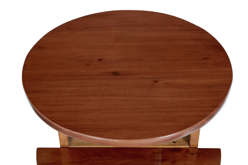 An early 20th-century metamorphic mahogany occasional table featuring an oval top shelf above a lower demi-lune shelf supported by a wooden folding frame. View II