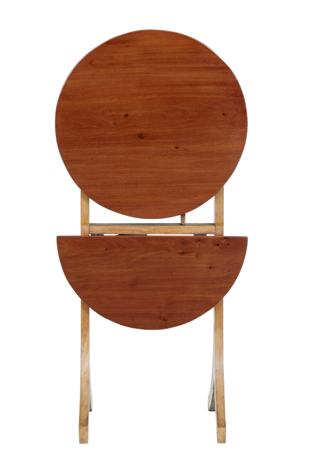 An early 20th-century metamorphic mahogany occasional table featuring an oval top shelf above a lower demi-lune shelf supported by a wooden folding frame. View IV