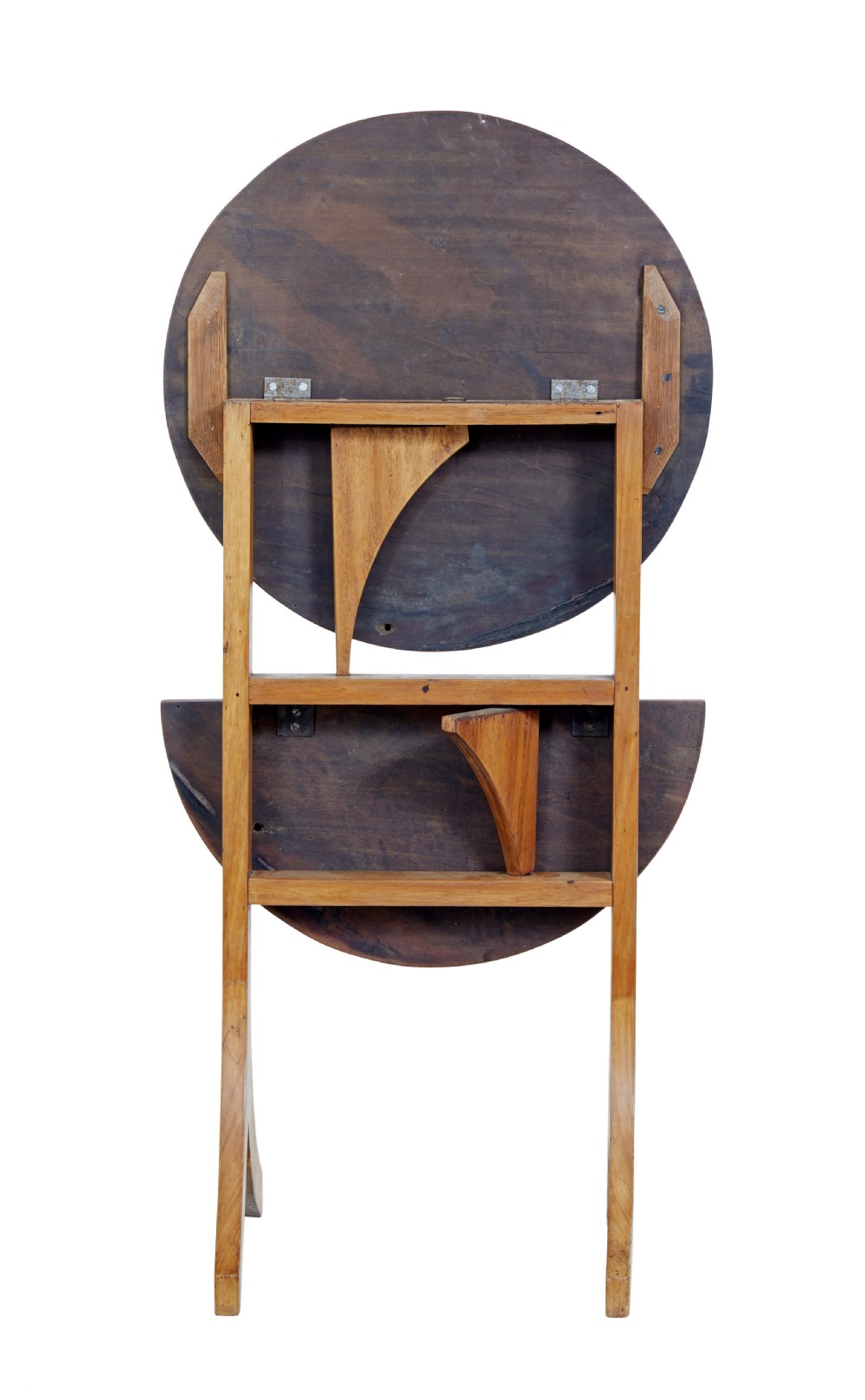 An early 20th-century metamorphic mahogany occasional table featuring an oval top shelf above a lower demi-lune shelf supported by a wooden folding frame. View V