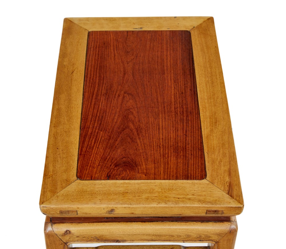 A pair of late nineteenth-century Chinese hardwood occasional tables featuring rectangular tops with inset panels, straight legs, and subtle waist aprons. View II