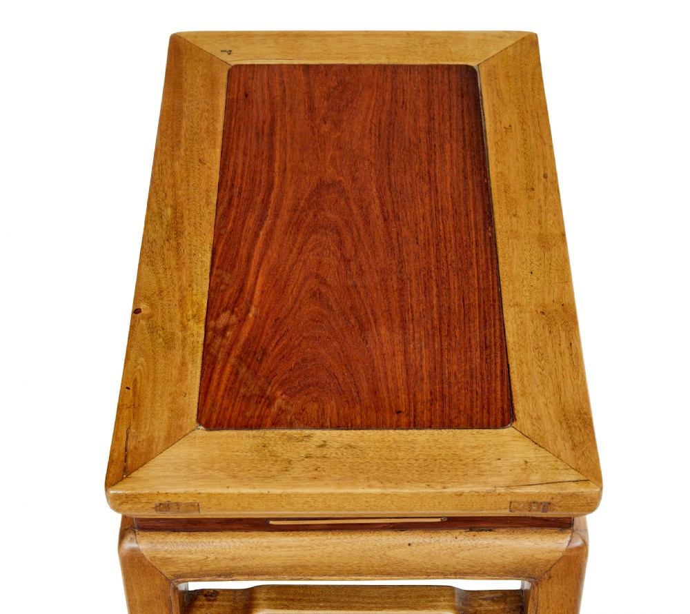 A pair of late nineteenth-century Chinese hardwood occasional tables featuring rectangular tops with inset panels, straight legs, and subtle waist aprons. View III