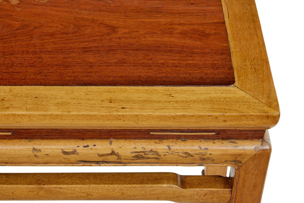 A pair of late nineteenth-century Chinese hardwood occasional tables featuring rectangular tops with inset panels, straight legs, and subtle waist aprons. View IV