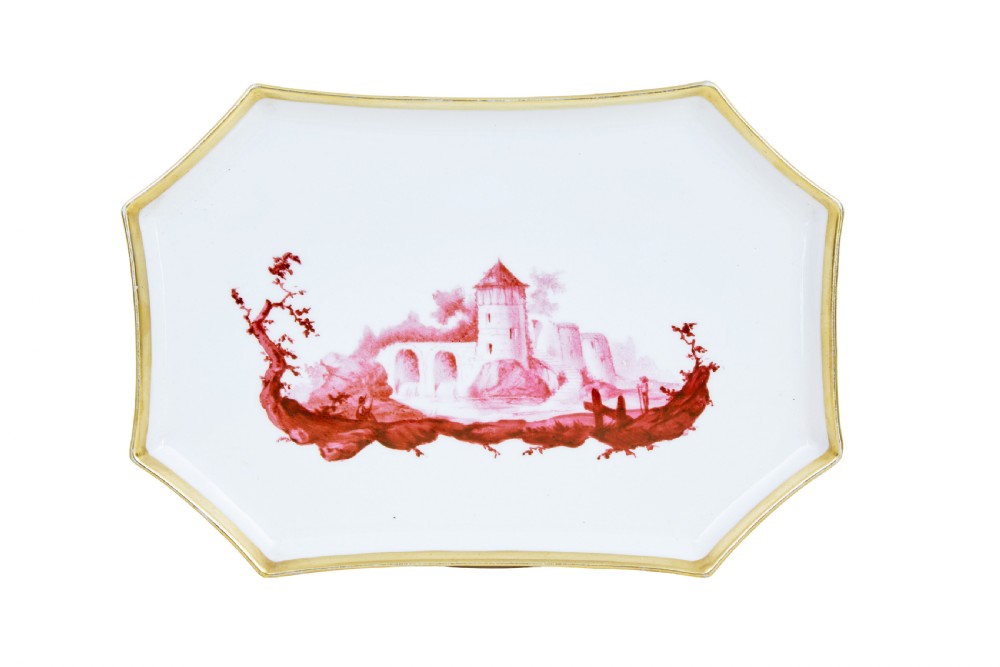 A seven-piece French porcelain dessert set featuring six twin-handled covered cream pots and a matching shaped tray, decorated with pink landscape scenes and gilded handles. View III