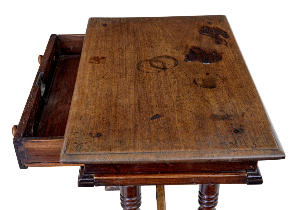 An 18th-century rustic walnut side table featuring turned legs, a single drawer with wooden knobs, and a low stretcher base. View IV