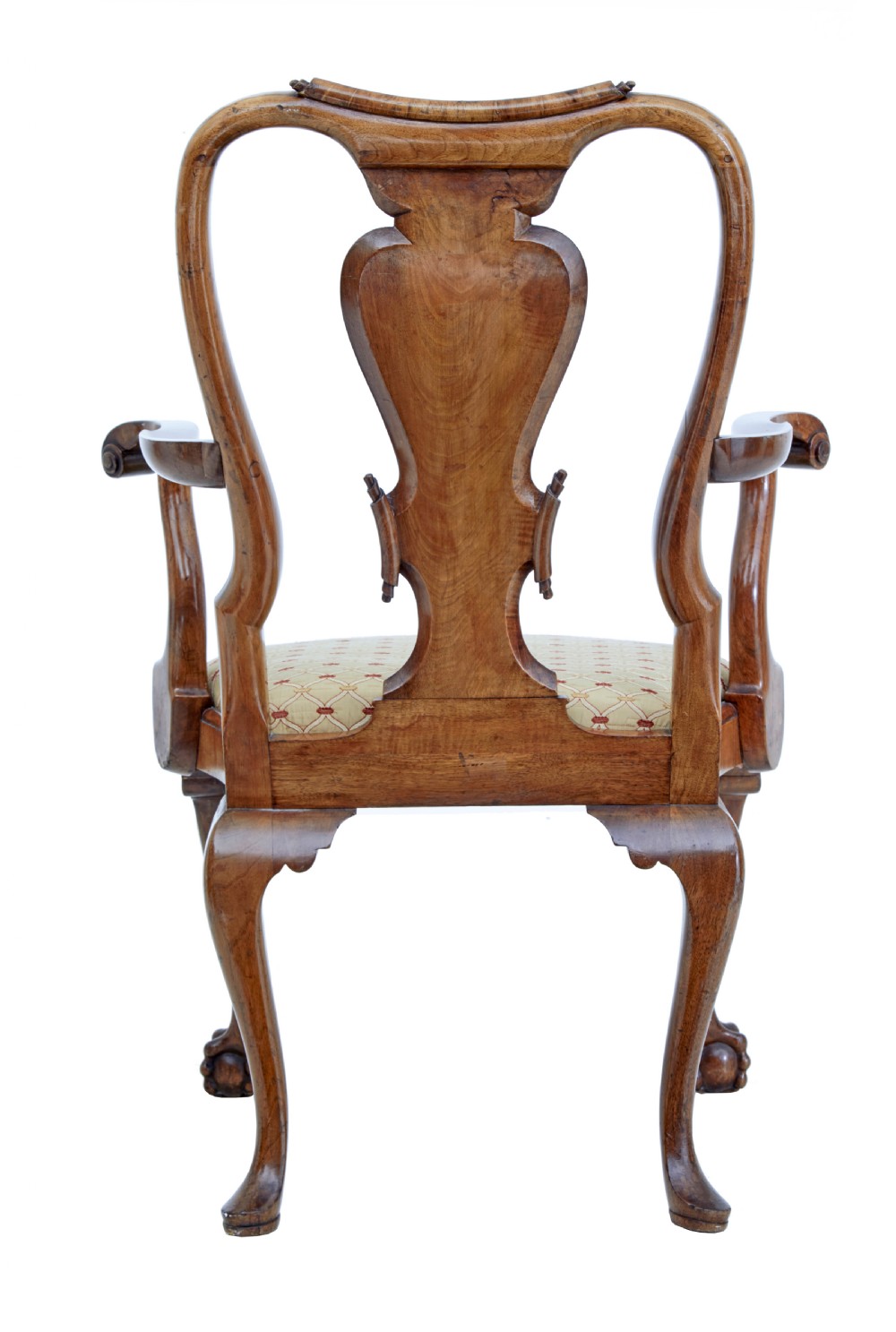 A set of carved walnut dining chairs featuring vasiform splat backs, upholstered drop-in seats, and cabriole legs ending in claw and ball feet. View IV