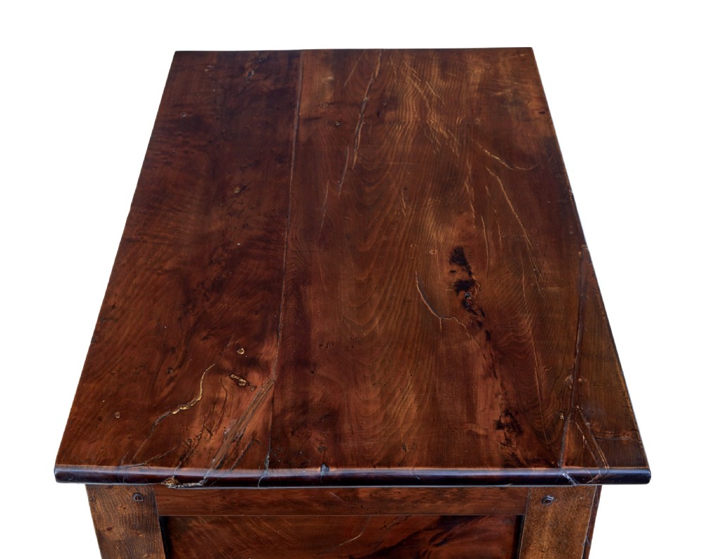 An 18th-century yew wood lowboy table featuring a single drawer with brass handles, a scalloped apron, and turned legs. View II