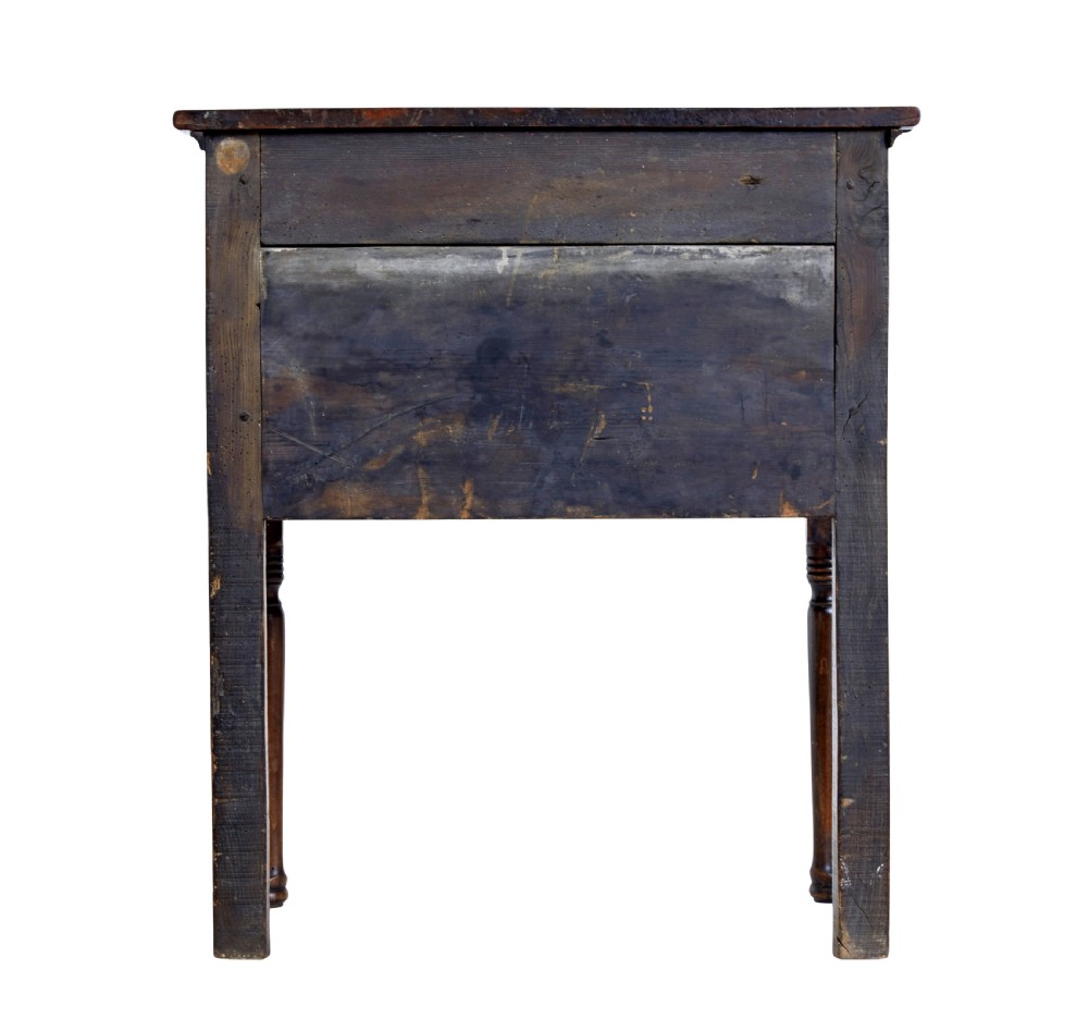 An 18th-century yew wood lowboy table featuring a single drawer with brass handles, a scalloped apron, and turned legs. View VI